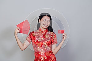 Woman wearing traditional cheongsam qipao dress photo