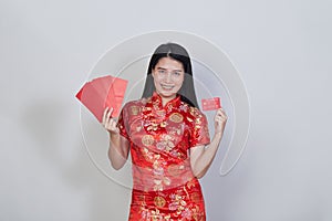 Woman wearing traditional cheongsam qipao dress photo