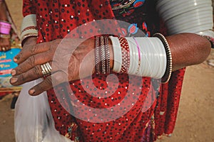Woman wearing traditional colourful clothing and jewellery