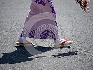 Woman wearing traditional Japanese two toed tabi socks