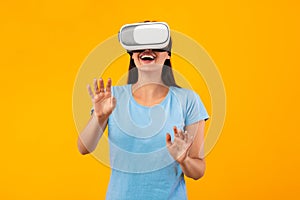 Woman wearing virtual reality headset at the studio