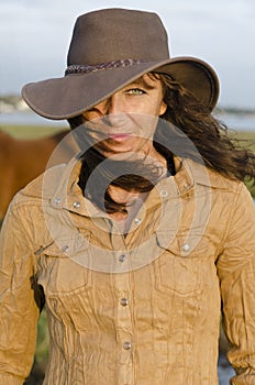 Woman wearing western hat