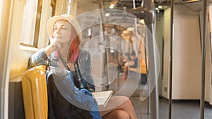 Woman westerner admire view from train`s window