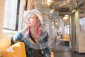 Woman westerner write admire view from train`s window