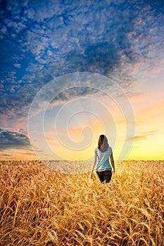 Woman in wheat field