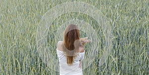 Woman in a wheat field.