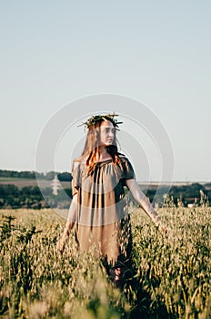 Woman in wheat field