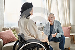A woman in a wheelchair engages