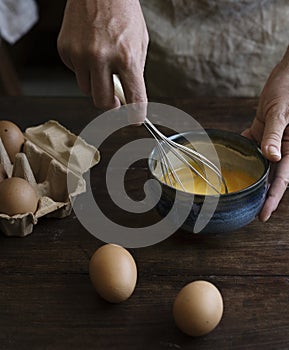 Woman whisking eggs food photography recipe idea