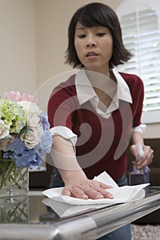 Woman Whisking With Napkin