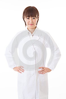 Woman in a white coat