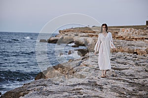 Woman in white dress nature travel lifestyle ocean