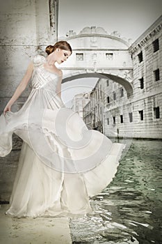 Woman in white dress, in Venice, Italy