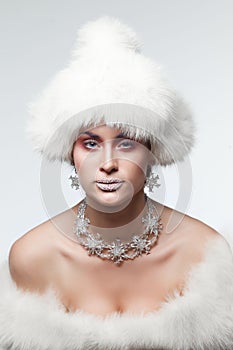 Woman in white fur hat photo