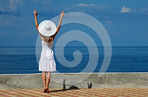 Woman in a white hat have fun