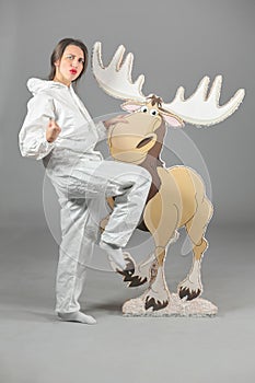 Woman in white protective suit of synthetic paper photo