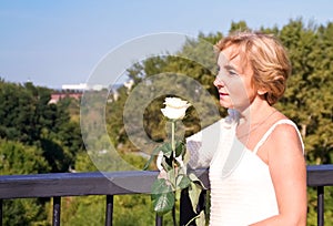 Woman with white rose