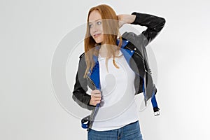 Woman in white t shirt and black leather jacket isolated on white background. Red hair girl in fashion clothes front view. Blank