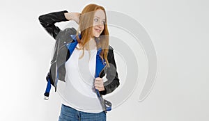 Woman in white t shirt and black leather jacket isolated on white background. Red hair girl in fashion clothes front view. Blank