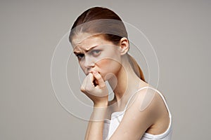 woman in white t-shirt toothache health problems disorder studio treatment