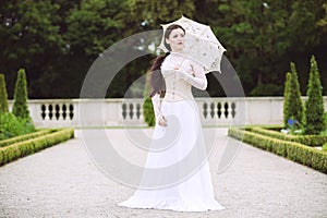 Woman in white Victorian dress