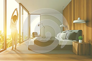 Woman in white and wood panoramic bedroom
