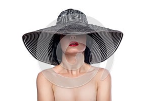 Woman in a wide brim hat