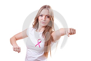 Woman wih pink ribbon on chest punching boxing