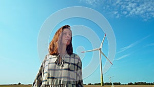 Woman At The Wind Turbine