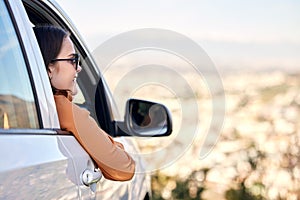 Woman, window and car for road trip, adventure and freedom in countryside while on vacation on weekend. Travel