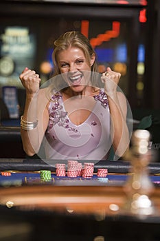 Woman winning at roulette table