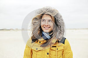 Woman in winter on the beach