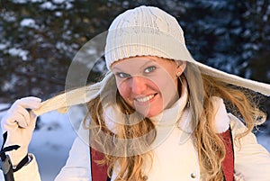 Woman in winter forest.