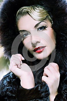 Woman in winter fur coat