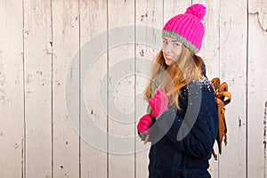 Woman in winter with old Dutch wooden ice skates