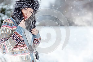 Woman winter portrait. Shallow dof.