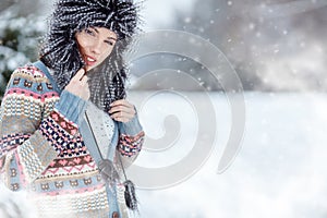 Woman winter portrait. Shallow dof. photo