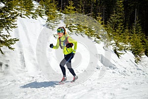 Woman winter running in beautiful inspirational landscape