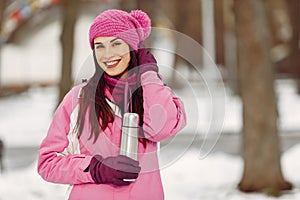 Woman in winter sports clothes looking at camera