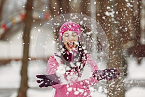 Woman in winter sports clothes looking at camera