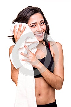 Woman wiping sweat with towel