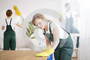 Woman wiping the table