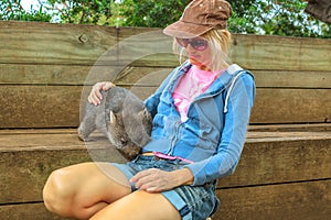 Woman with Wombat joey