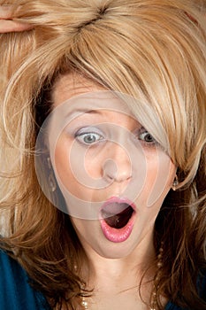 Woman wonder face with open mouth