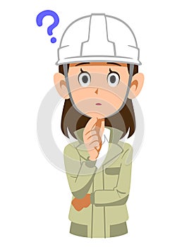 A woman in work clothes wearing a helmet with doubts
