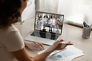 Woman worker speak on group video call on computer