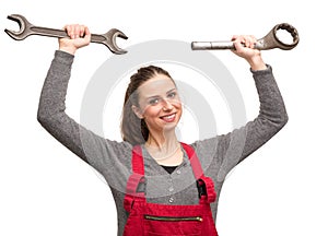 Woman worker with wrenches