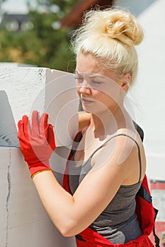 Woman working with airbricks