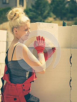 Woman working with airbricks