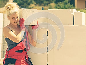 Woman working with airbricks